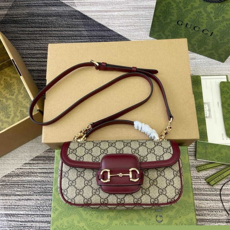 G*u*i top handle bags